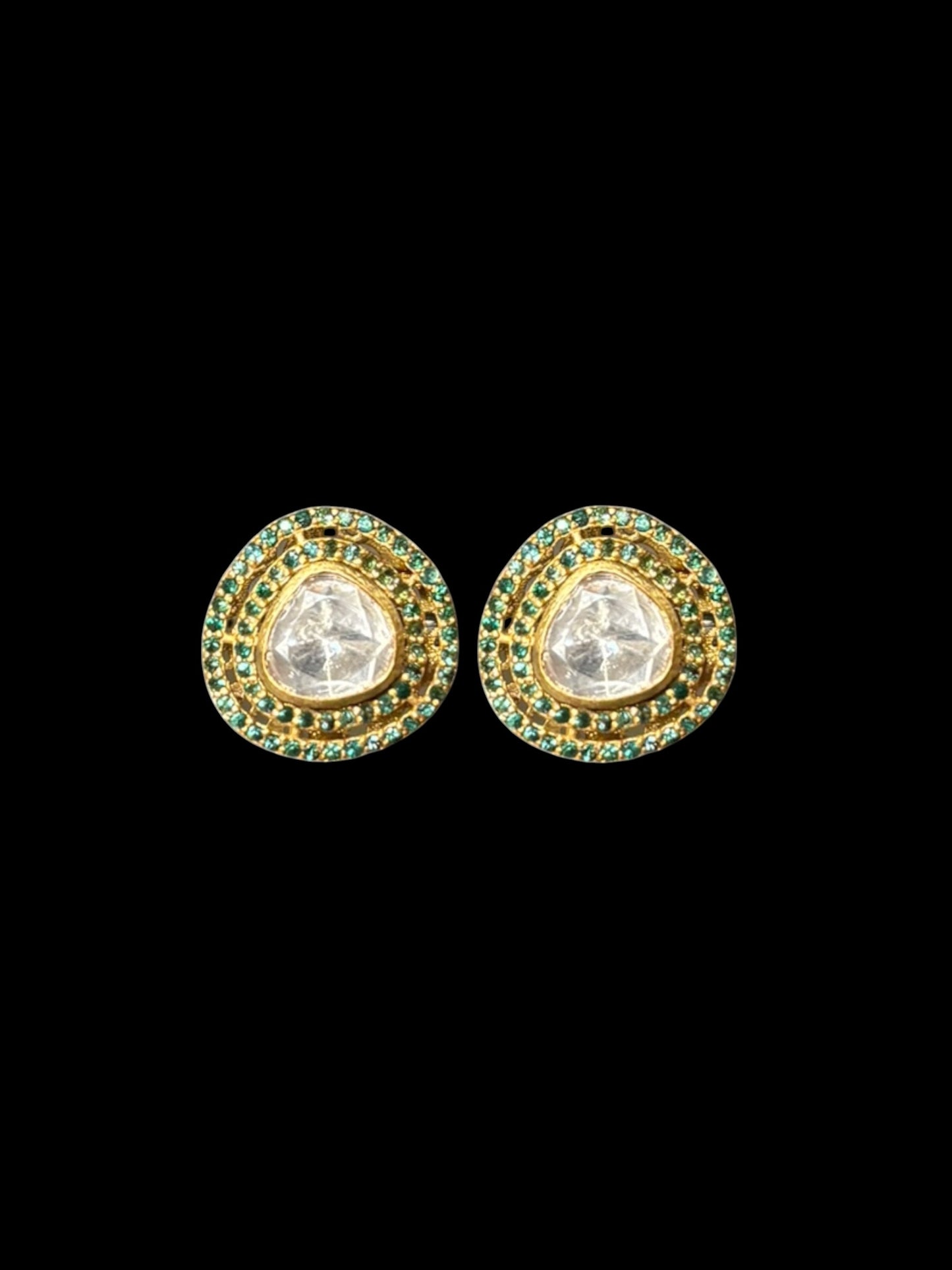 Silver traditional earrings with emeralds