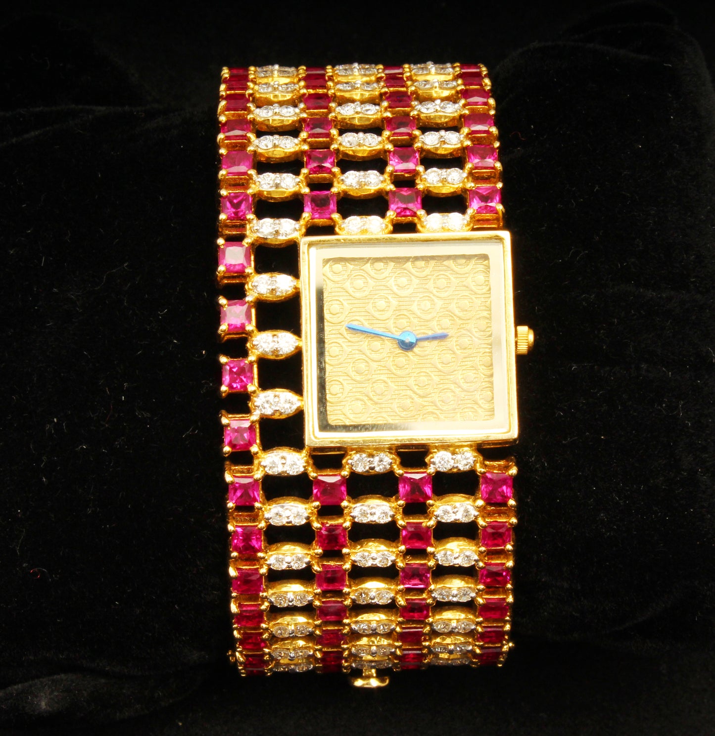 Gold ruby diamond watch