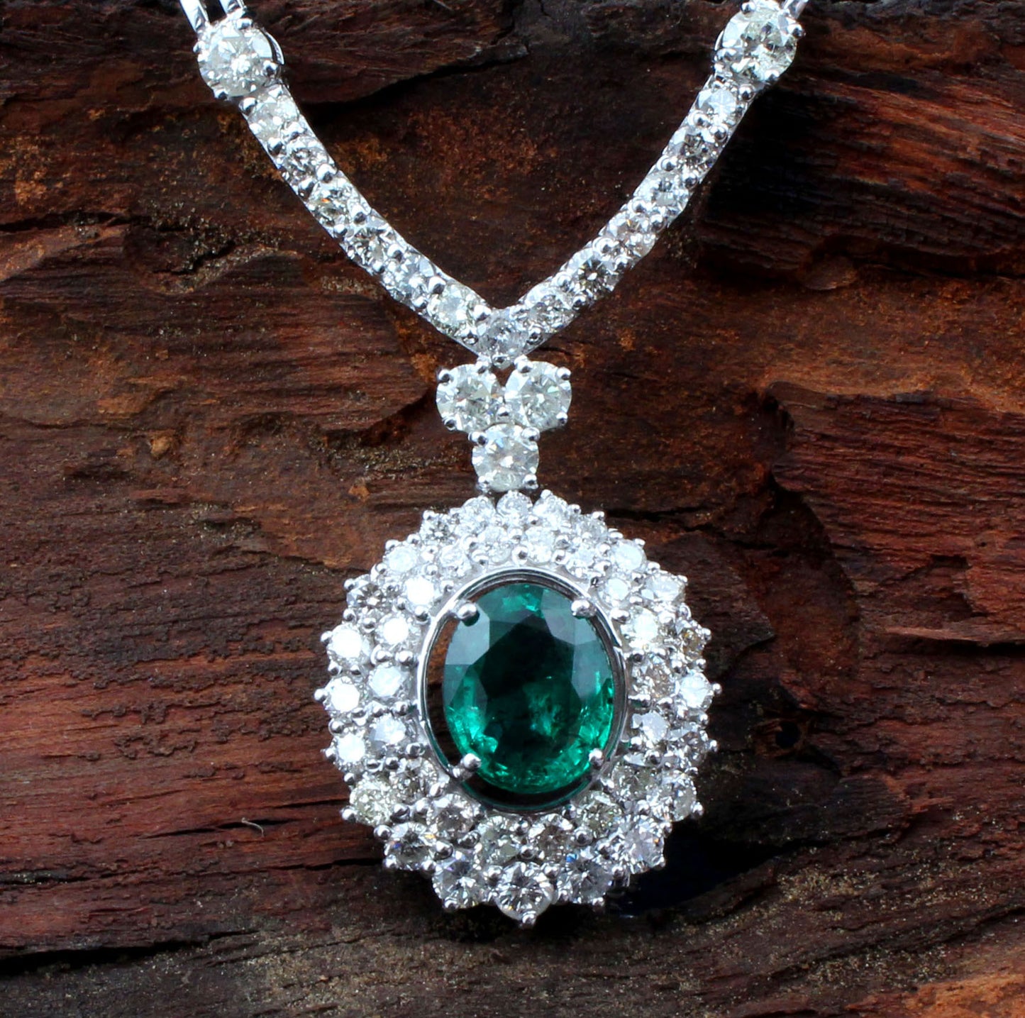 emerald diamond pendant earring set